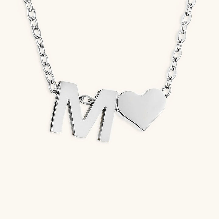 navnesmykke med initialen Ria | 18k Guld